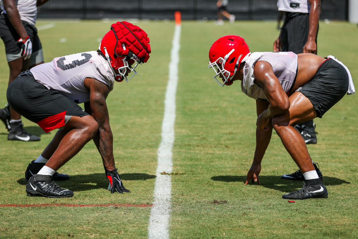 Nolan Smith prepares to give Robert Beal a look in practice. 